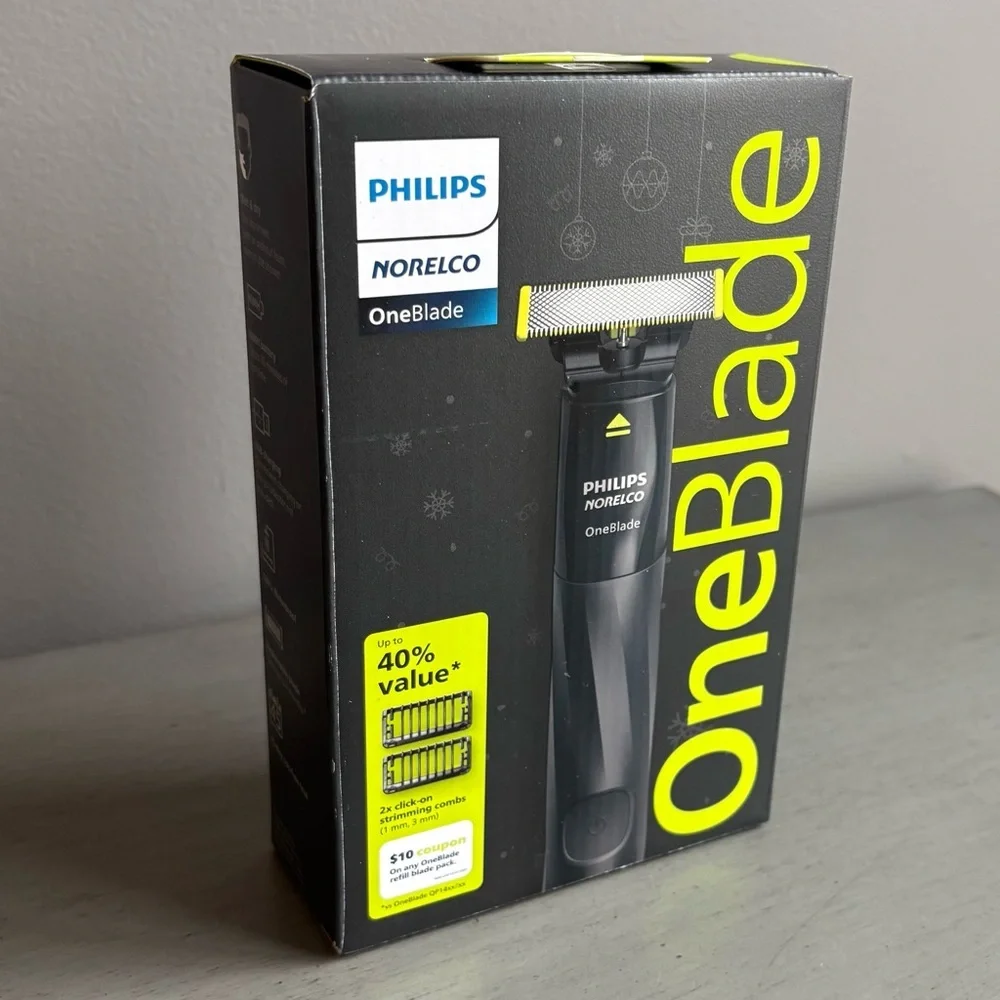 Philips Norelco OneBlade Razor - Trim, Edge & Shave - 1 Blade - 2 Combs Wet/Dry